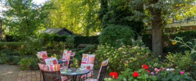 Tuin van zorgvilla Villa Marianna
