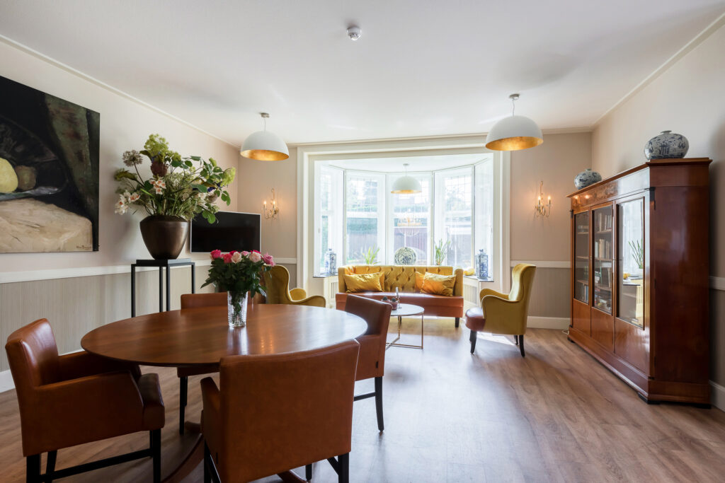 Gemeenschappelijke woonkamer bij Villa de Maere
